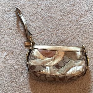 Coach gold wristlet